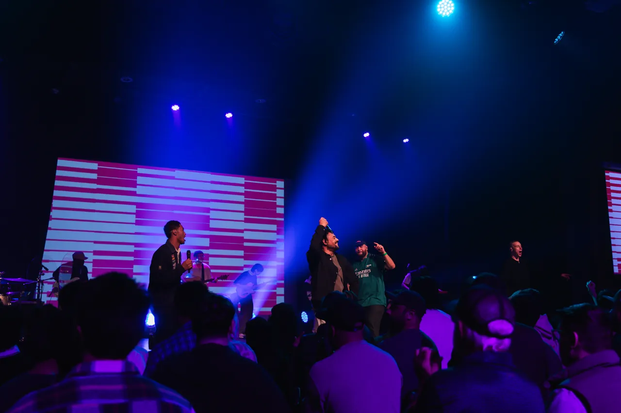 Men worshipping at Stronger